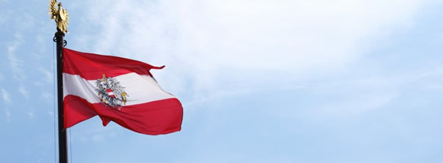 Domeny AT Austria (Flaga Austrii z godlem)